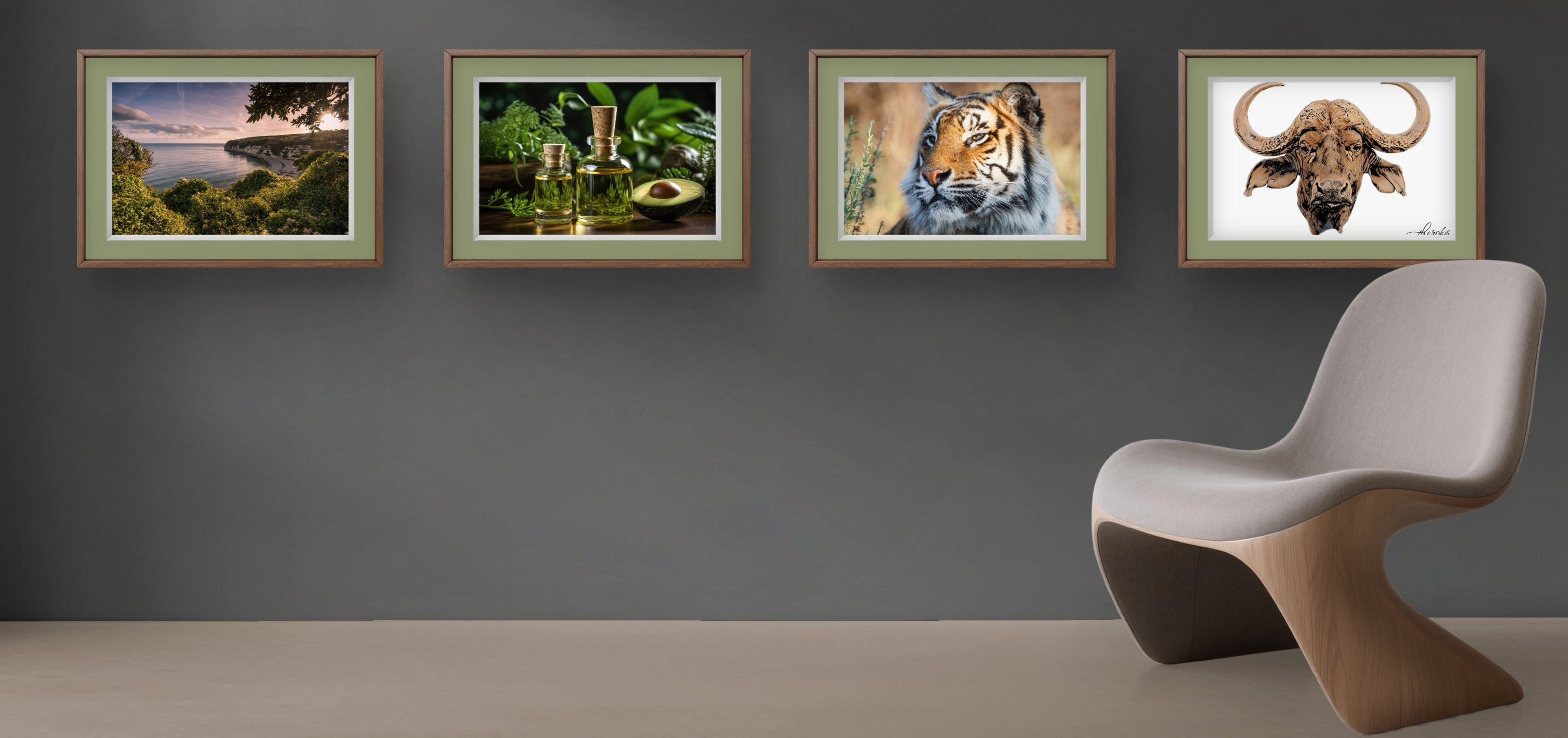 Four framed pictures of nature scenes on a gray wall with a modern chair.